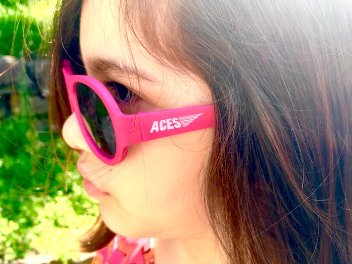 Maura wearing her Aces sunglasses